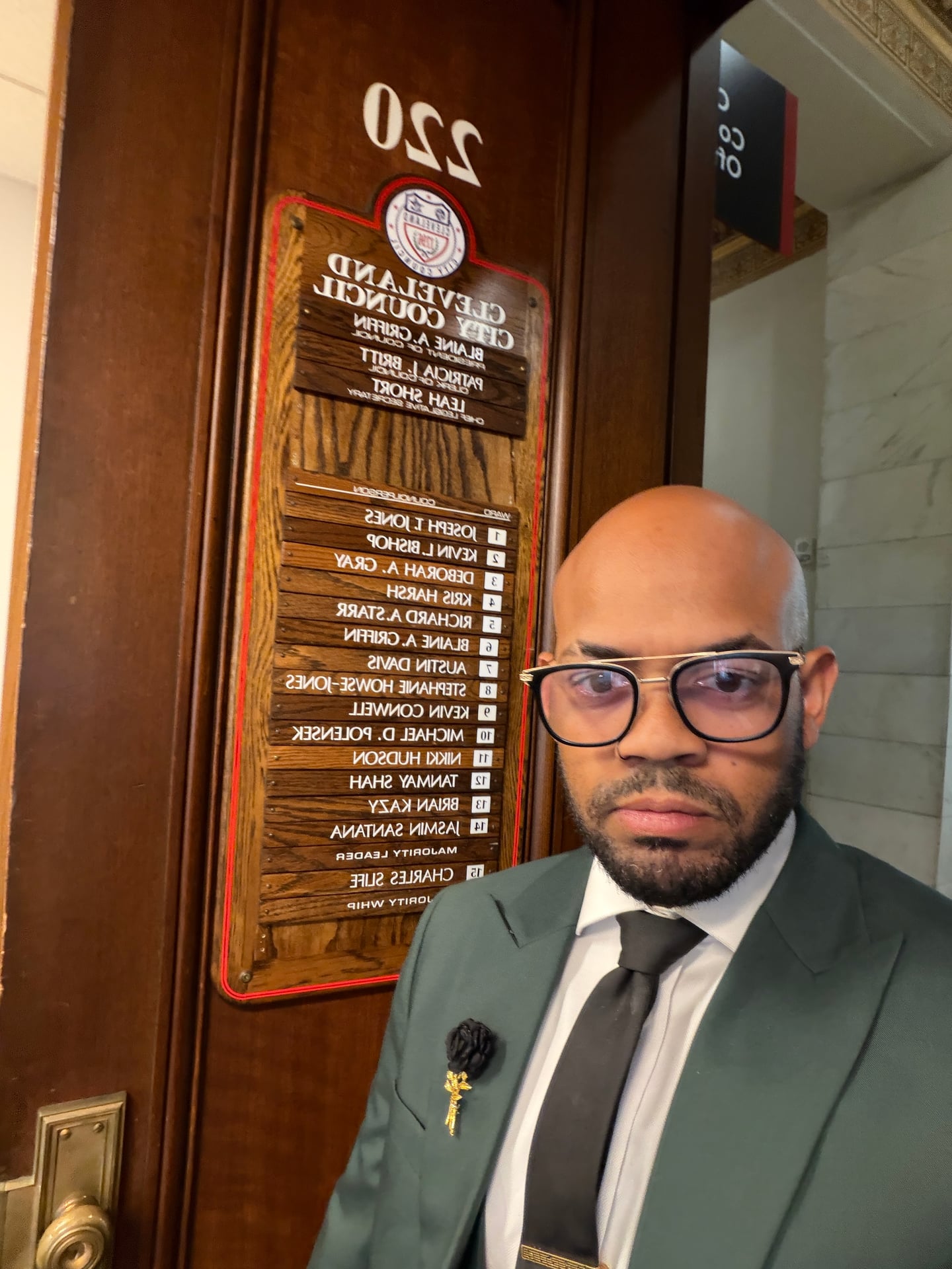 A selfie beside the Cleveland City Council office directory.